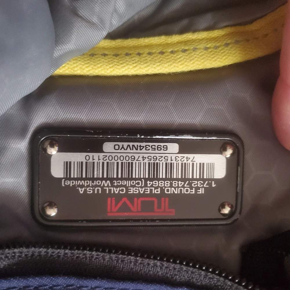 TUMI Navy Blue Organizer Travel Crossbody Bag.